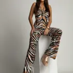 Kombinezon NB Leu zebra beżowo-czarny