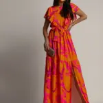 Sukienka wakacyjna NB Cappy pomarańczowo-różowa